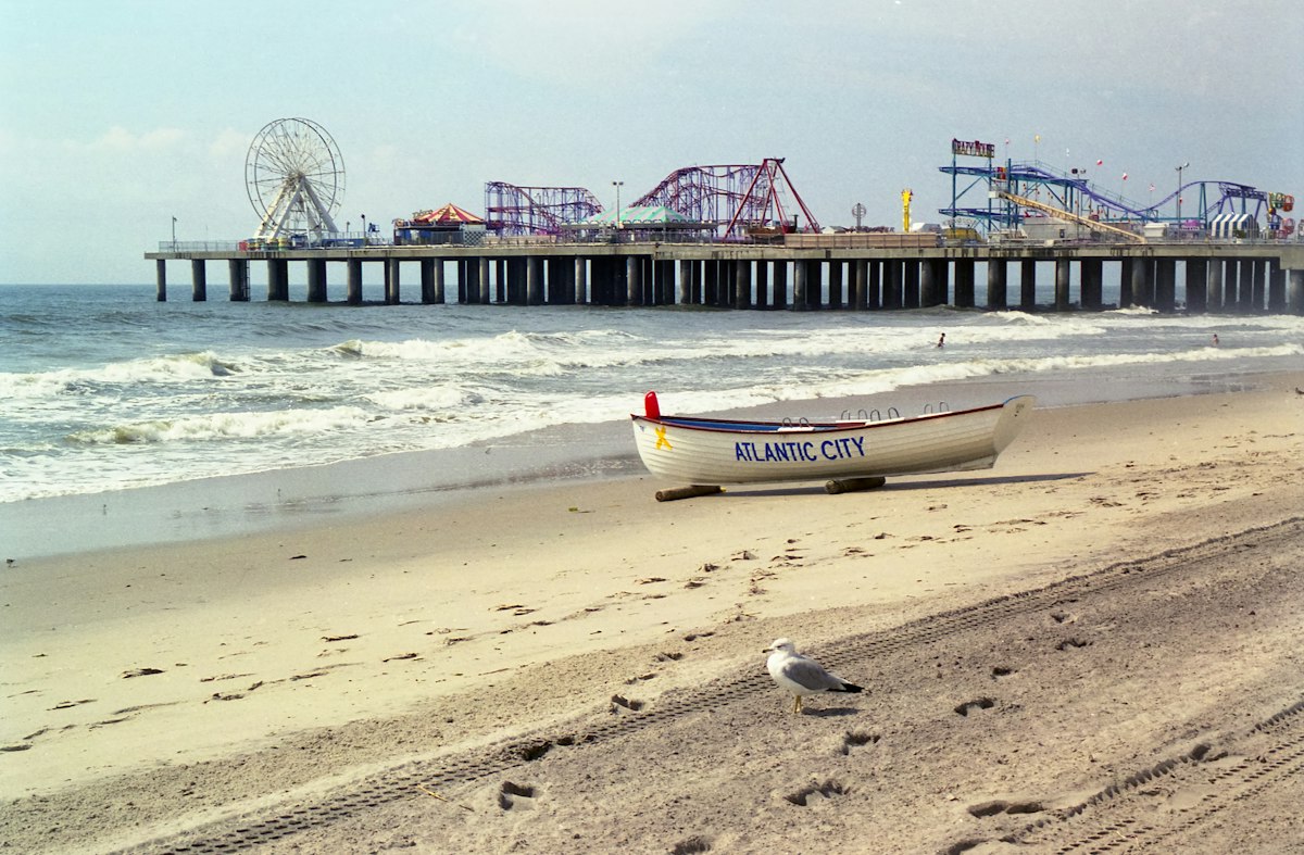 Lifeguard boat on the beach in front of the pier