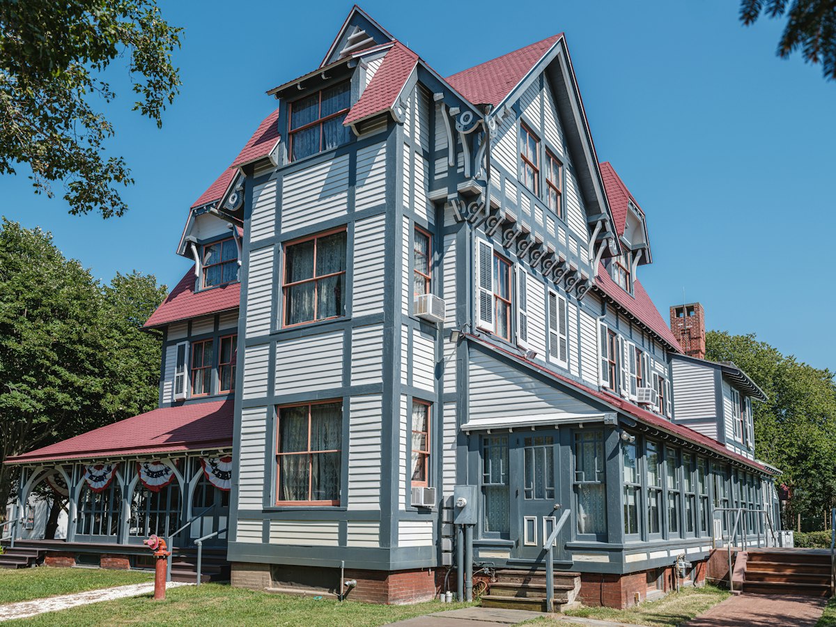 Victorian house with a red roof