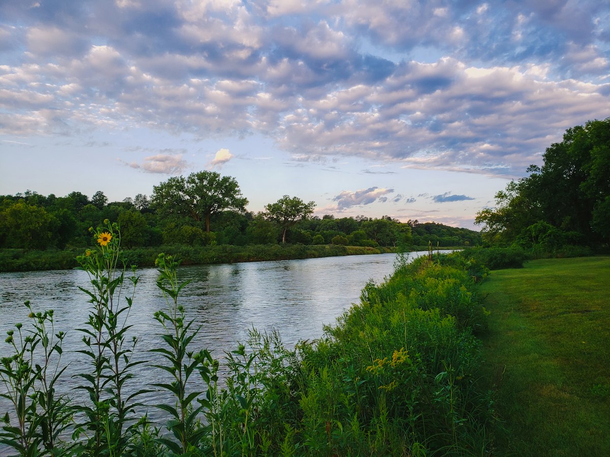 River bank under a cloudy sky