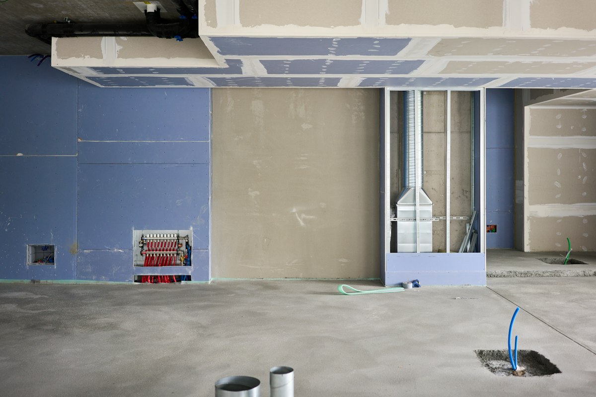 Room under renovation with bare walls
