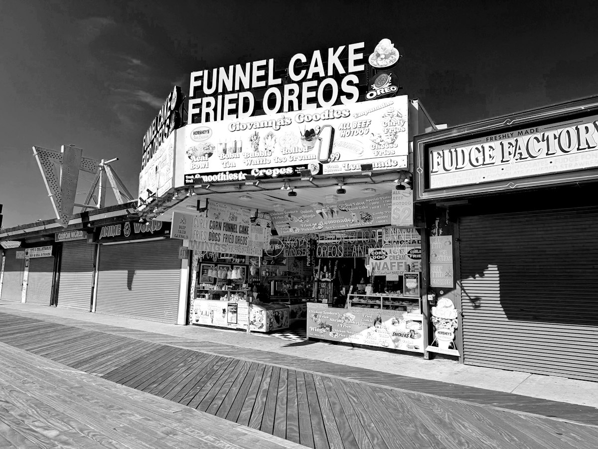 Boardwalk food stand selling funnel cakes